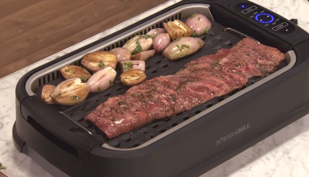 Spicy steak grilling on power smokeless grill